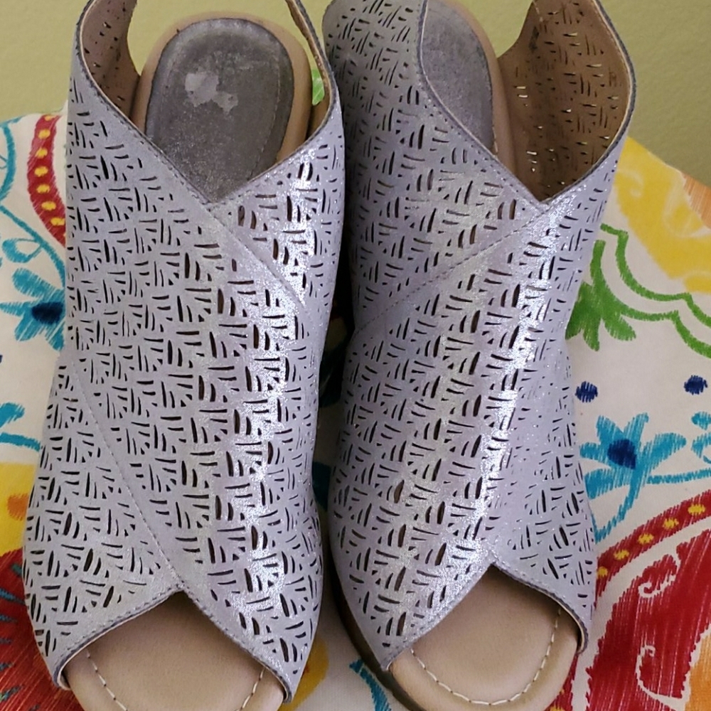 Shiny silver wedge shoes